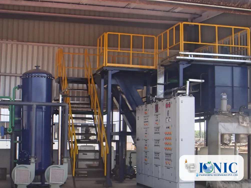 Industrial effluent treatment plant with clarifier tanks, an access platform and a control panel
