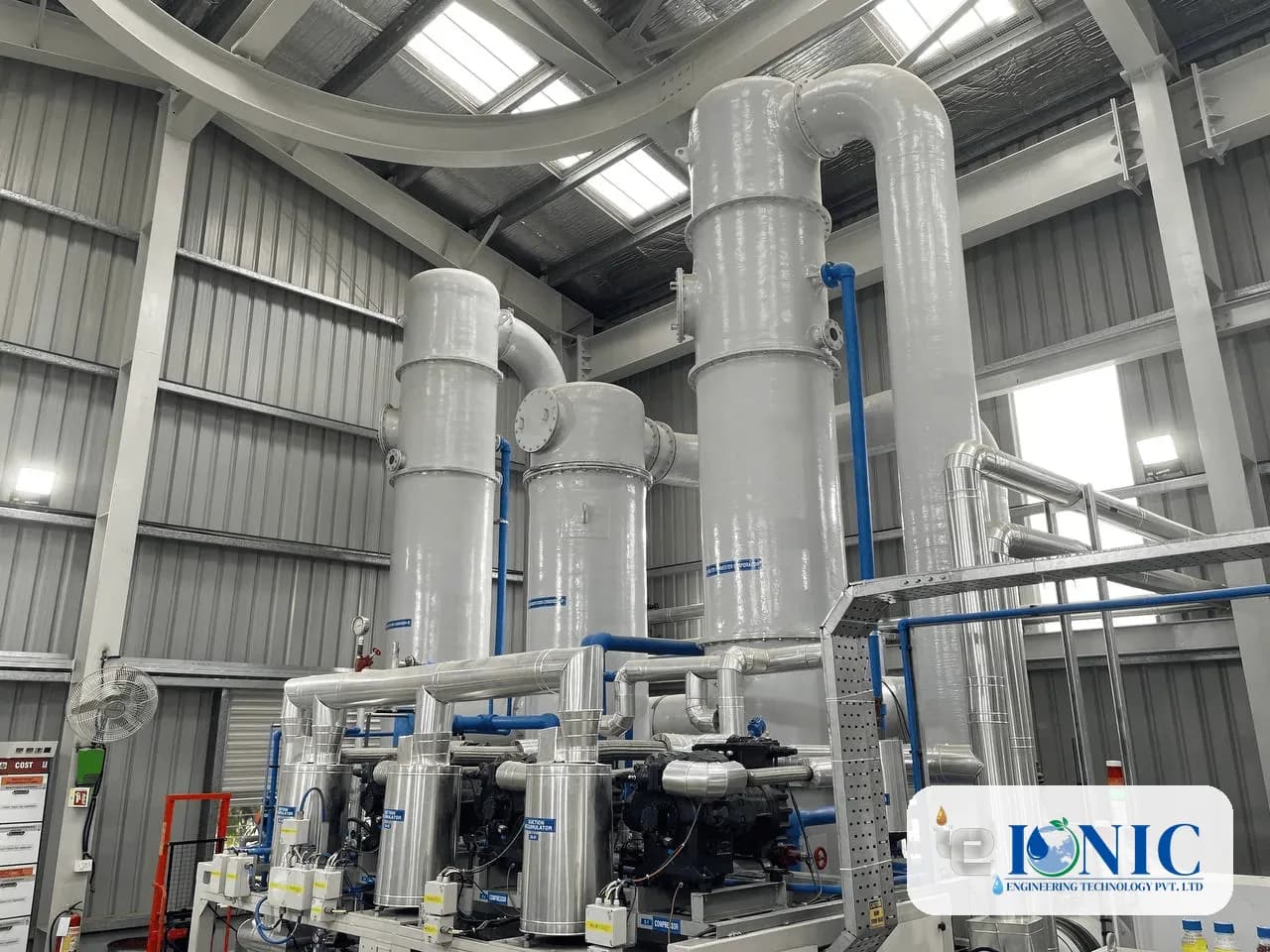 Zero liquid discharge system with tall process columns and pipework in an industrial plant